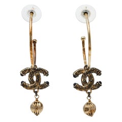 Chanel Aged Gold Tone CC Charm Drop Hoop Earrings