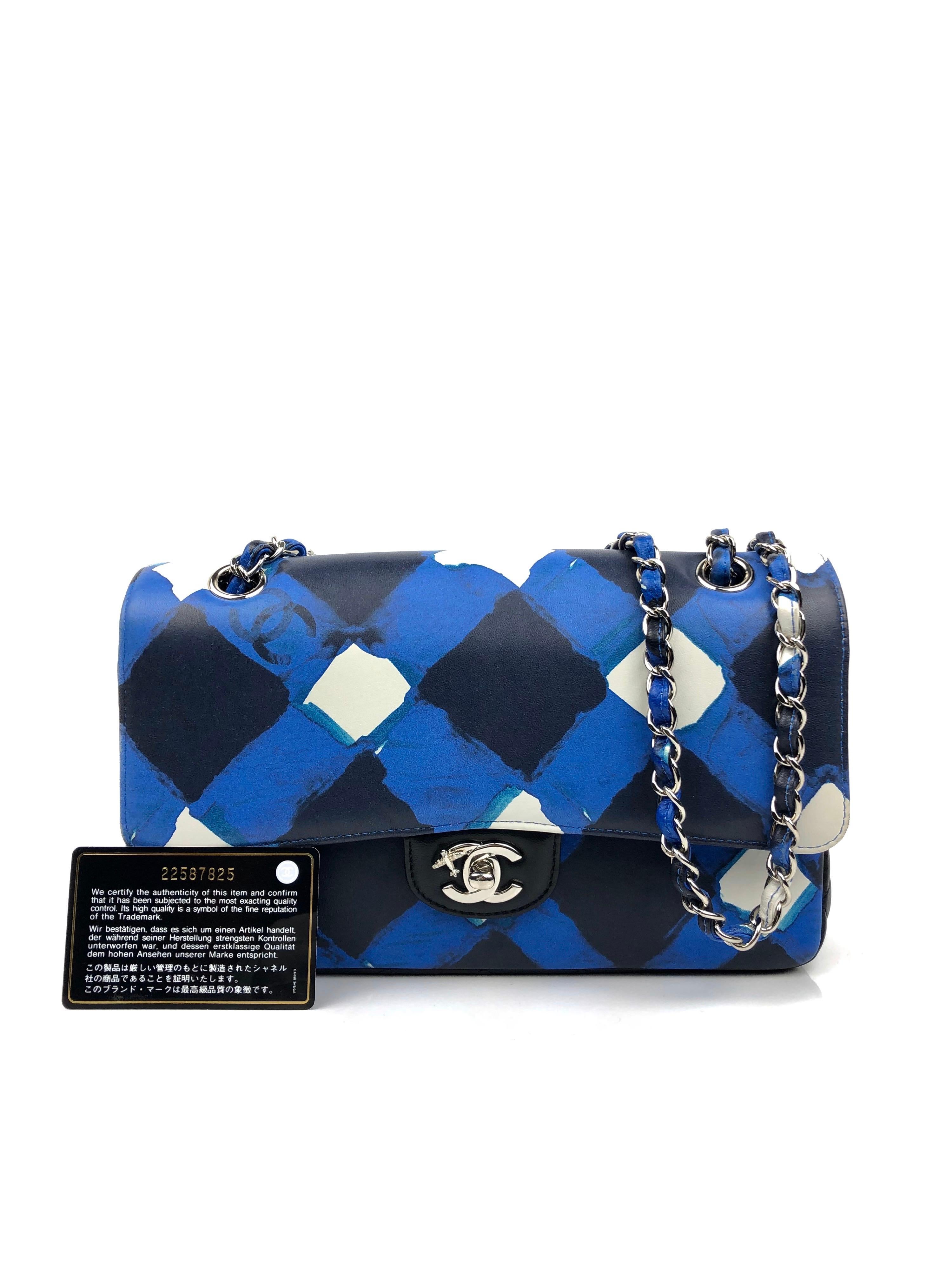 LIKE NEW RARE Chanel Airline Airplane Classic Medium Double Flap Blue Black White. 

Shop with Confidence from Lux Addicts. Authenticity Guaranteed! 