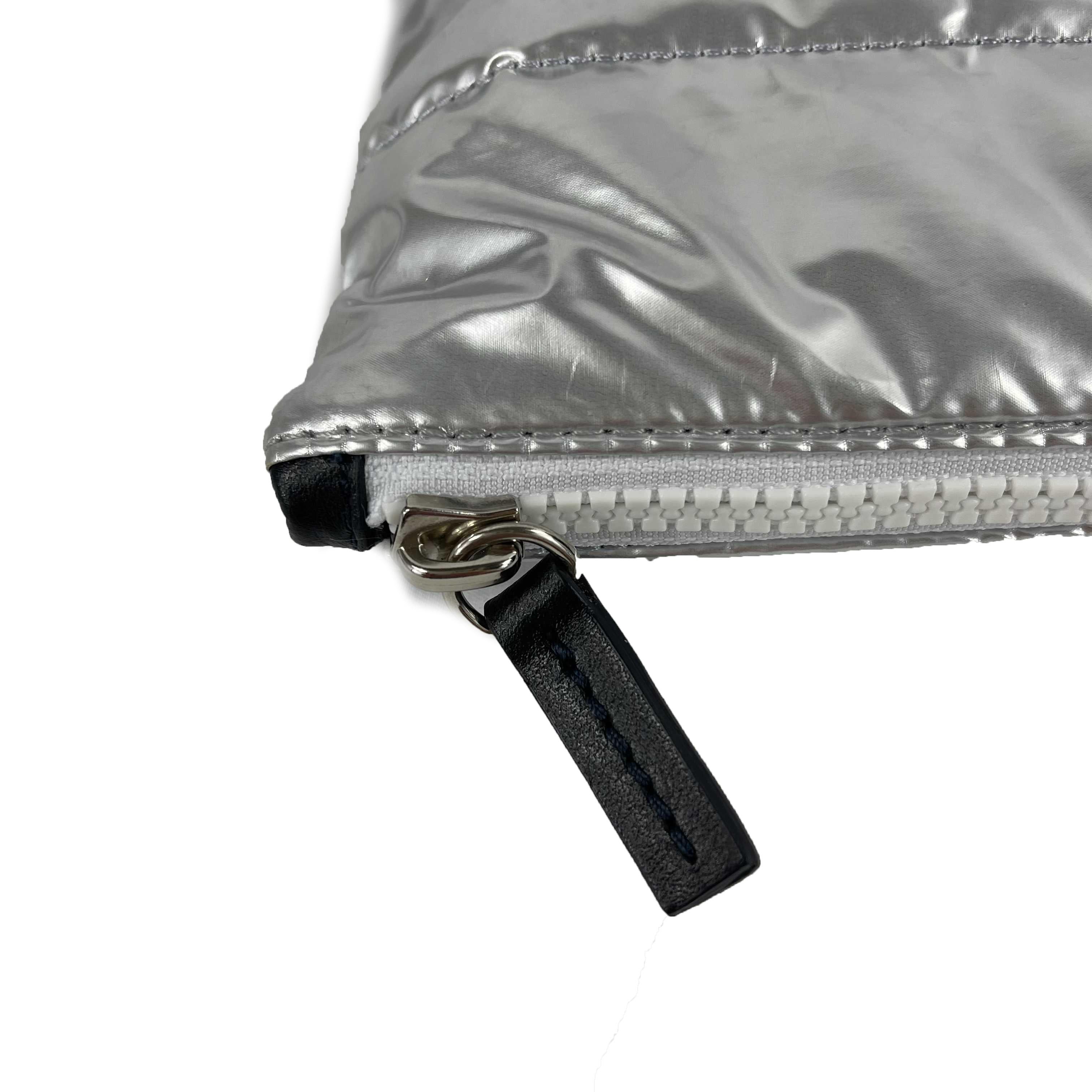 CHANEL Airlines Metallic Silver Puffer Pouch CC Logo / Microfiber Interior In Excellent Condition In Sanford, FL