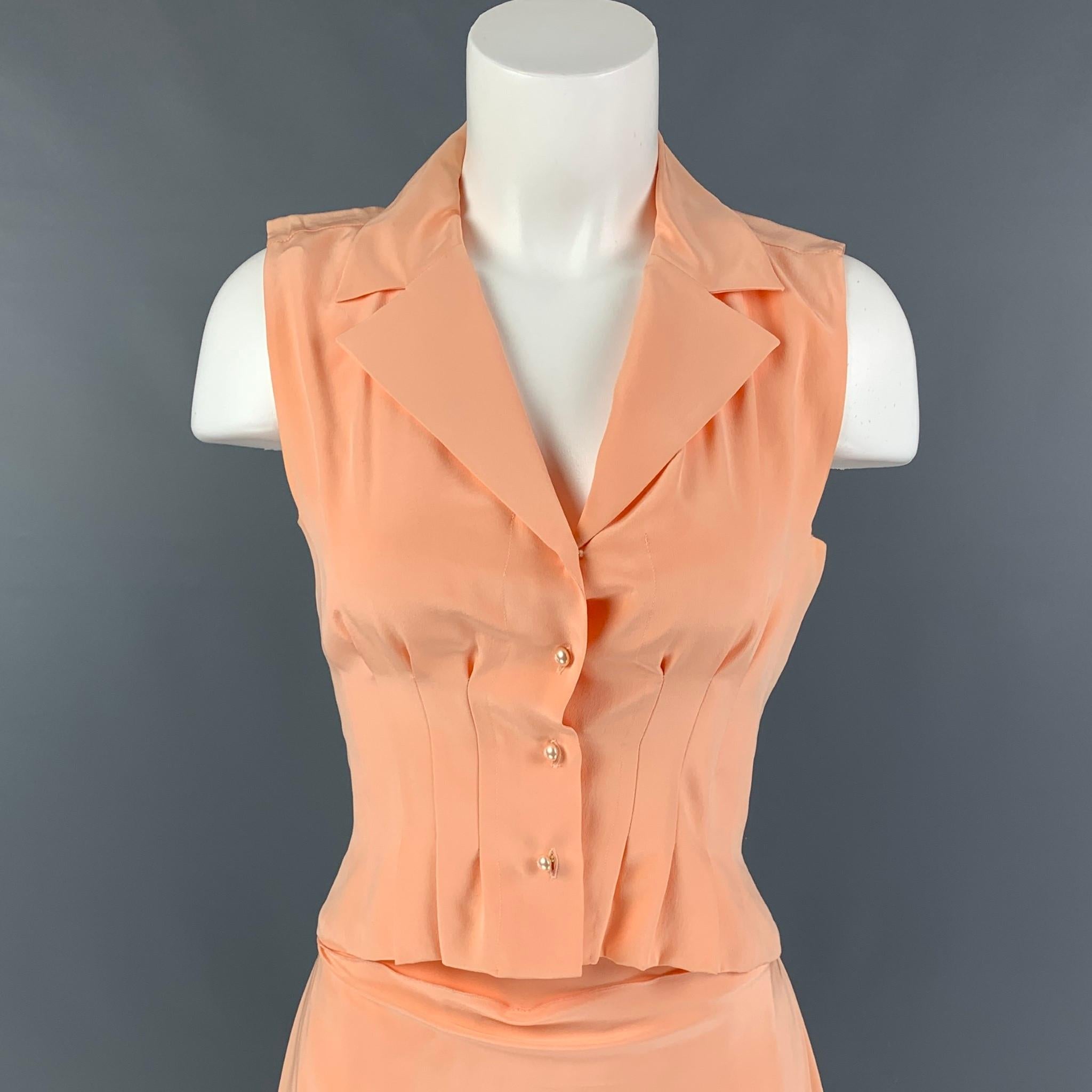 CHANEL skirt set comes in a salmon silk featuring a notch lapel, pleated, sleeveless, logo buttons, and a matching layered pleated skirt. Made in France. 

Very Good Pre-Owned Condition.
Marked: AJ508 03P / 36

Measurements:

-Blouse
Shoulder: 13