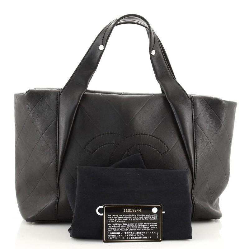 Condition: Damaged. Missing zipper pull on interior pocket. Wear on base corners and zipper pull, creasing and scuffs on exterior and handles. Indentations on rear, wear in interior, scratches and tarnish on hardware.
Accessories: Dust Bag,