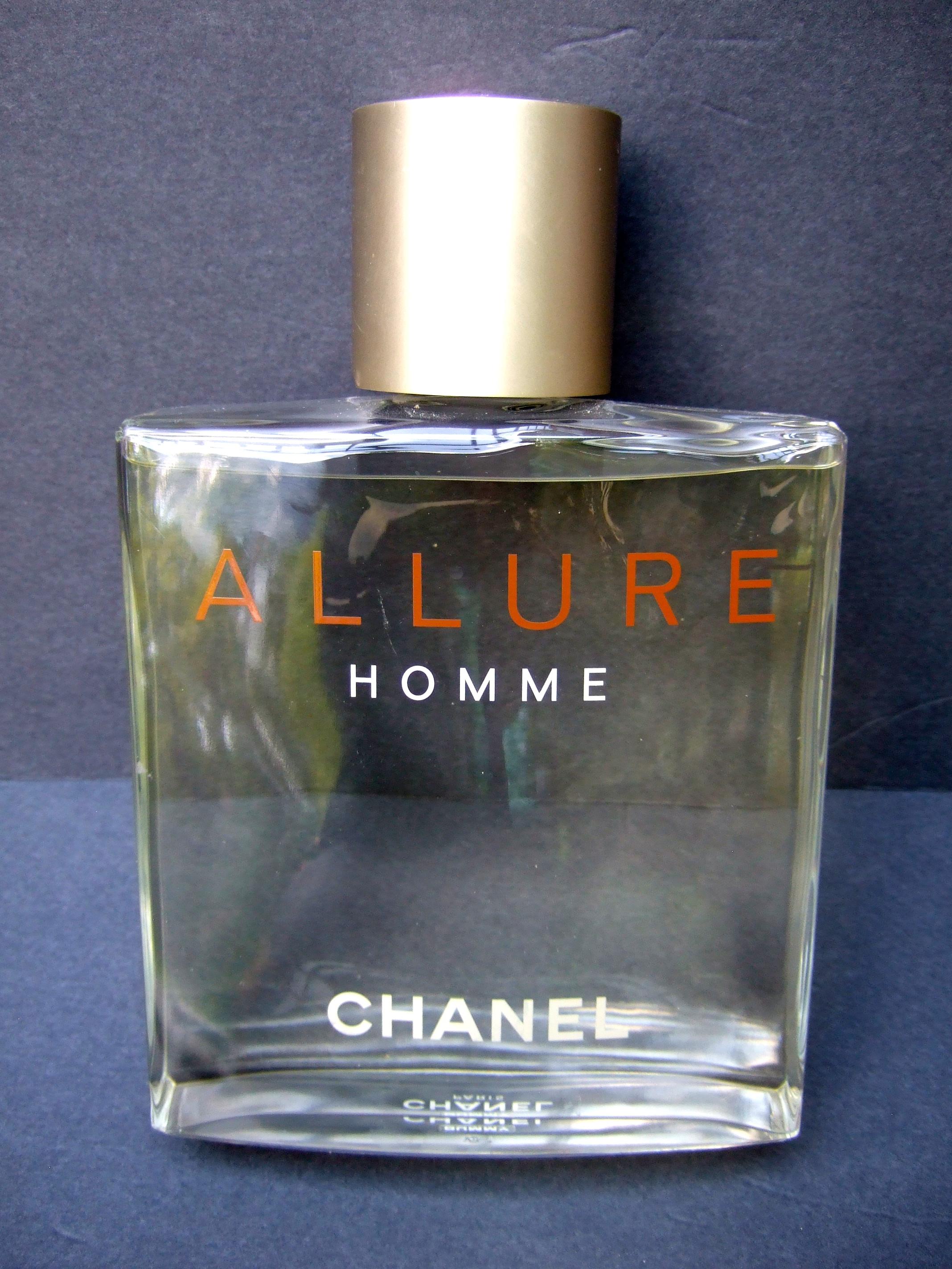 Chanel Allure Homme huge glass factice display dummy bottle c 21st 
The huge scale glass bottle makes a very stylish decorative collectible
 Factice dummy display bottle are filled with colored water
are displayed at department store fragrance