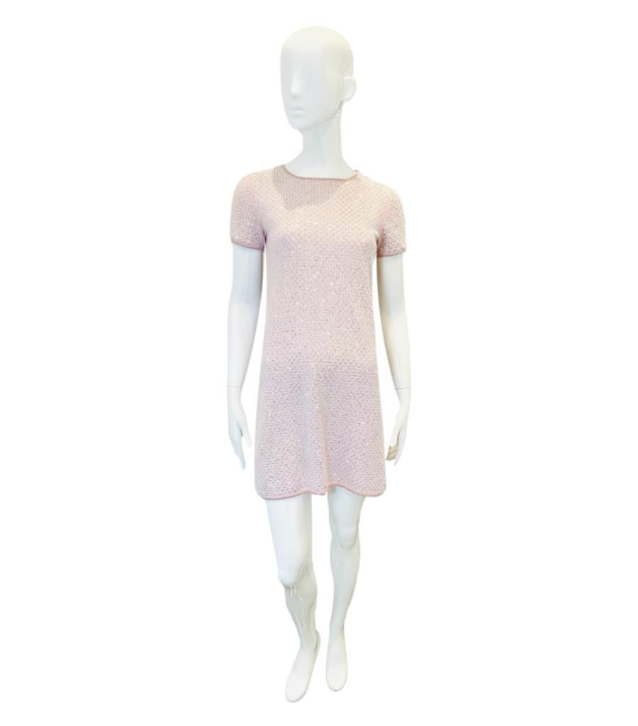 Chanel Angora Wool & Silk Rhinestone Studded Dress

Pale pink finely knitted dress with diamond pattern in silver crystal rhine stone

studs.

From 2017 collection.

Sized - 34FR

Condition - Excellent

Composition - 76% Angora Wool, 24% Silk 