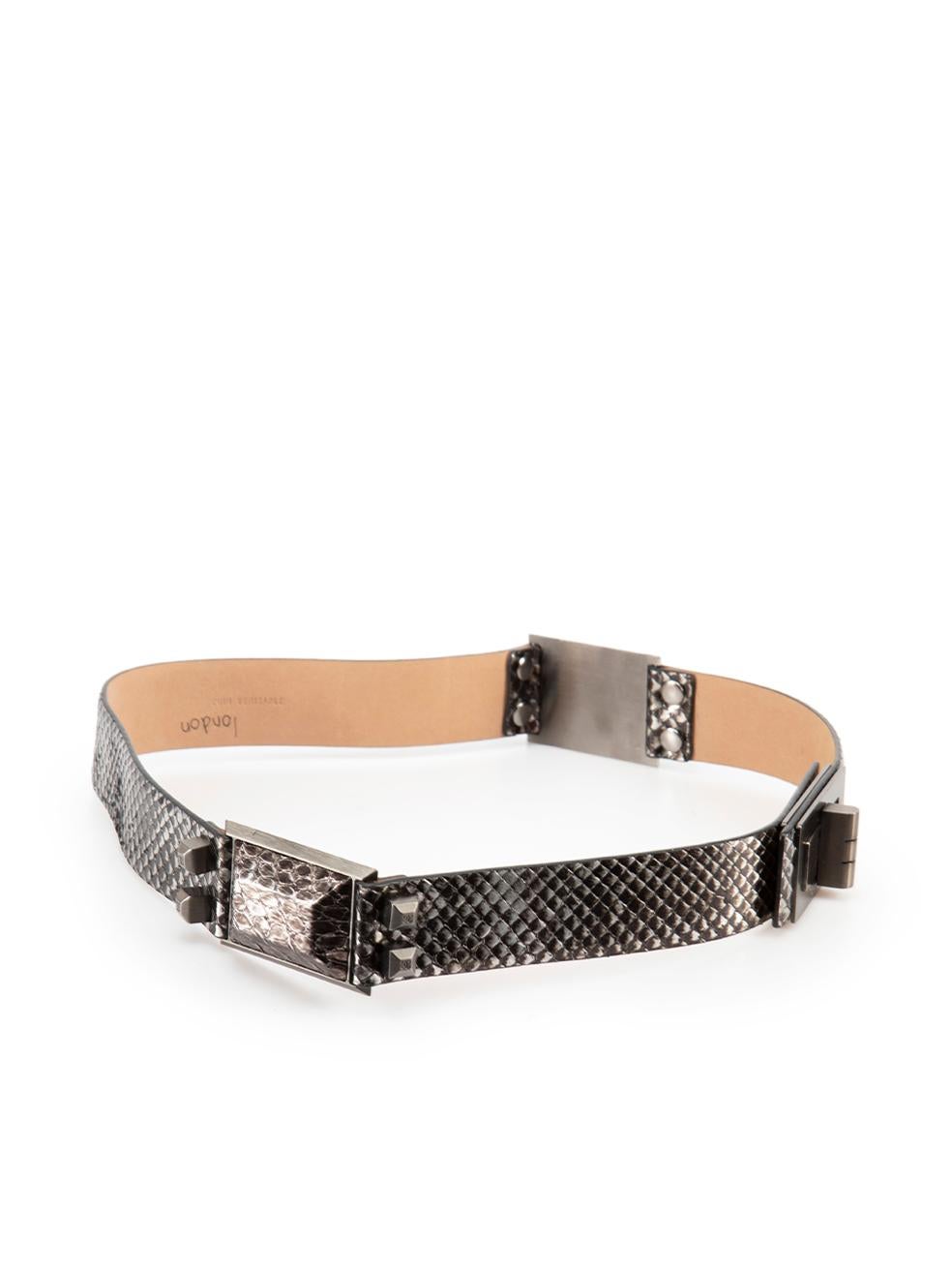 CONDITION is Very good. Minimal wear to belt is evident. Minimal wear to the lining with pen writing on this used Chanel designer resale item. Please note this belt is not adjustable.



Details


Anthracite

Snakeskin leather

Belt

Metallic