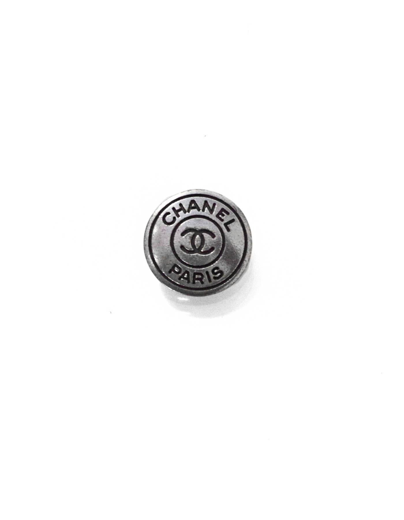 Chanel Antiqued Silver & Black CHANEL PARIS CC Buttons
Features set of two 20mm buttons

Color: Silver, black
Hardware: Silvertone
Materials: Metal
Stamp: CHANEL
Overall Condition: Excellent good pre-owned condition, light surface
