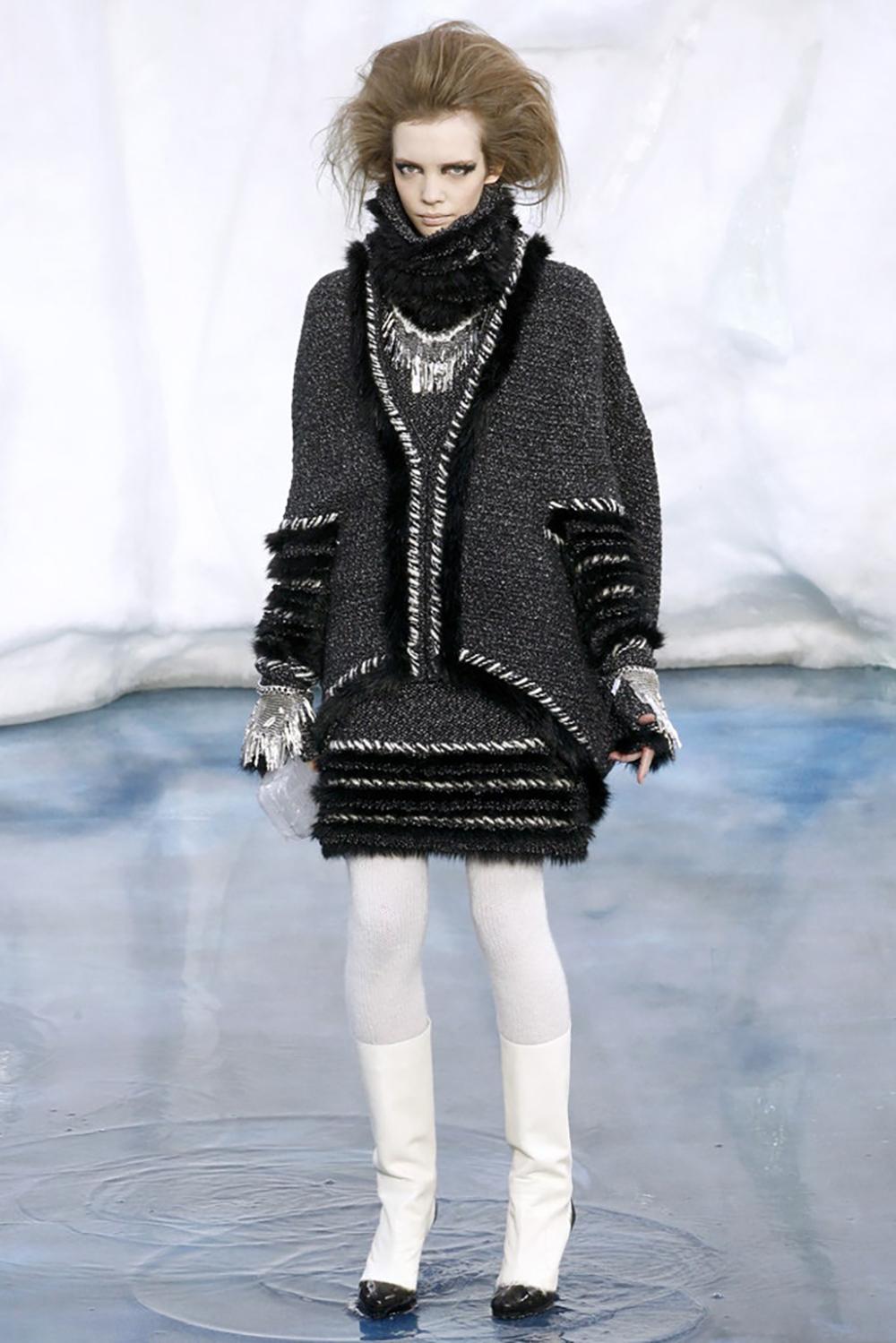 Stunning Chanel black cashmere dress with charming fluffy accents : from Ad Campaign of ARCTIC ICE Collection
- CC logo charm at pocket
Size mark 40 FR / Condition is pristine