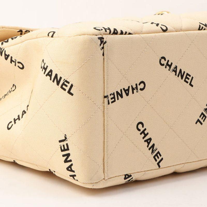 Chanel Around 1995 Made Canvas Logo Print Classic Flap Chain Bag Maxi Beige For Sale 6