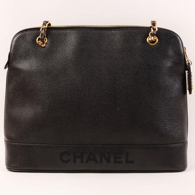 Chanel Around 1997 Made Caviar Skin Logo Embroidered Tote Bag Black

Additional information:
Measurements: H 27 x W 34 x D 9 cm 
Shoulder drop: 89 cm

This item has been used and may have some minor flaws.