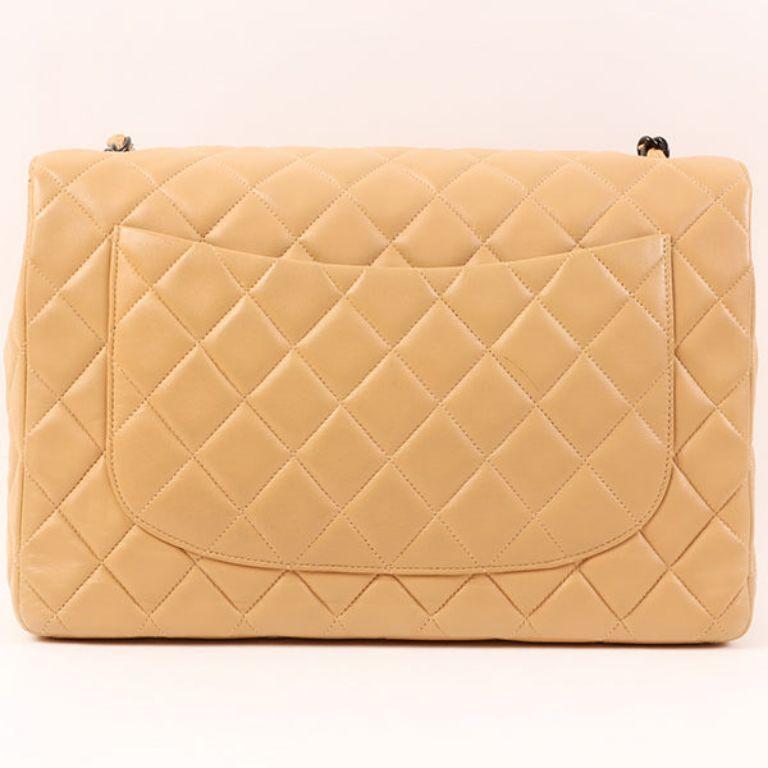Chanel Around 1997 Made Classic Flap Turn-Lock Chain Bag Jumbo Beige/Black

Additional information:
Measurements: H 21 x W 30 x D 8 cm 
Shoulder drop: 85 cm

This item has been used and may have some minor flaws.
