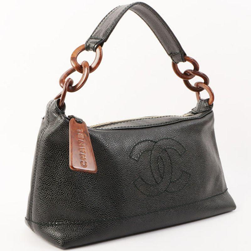 Chanel Around 2001 Made Caviar Skin Cc Mark Stitch Wood Plate Top Handle Bag Black

Additional information:
Interior pocket x1
Comes with: Guarantee card, Serial number sticker
Year: 2001
Made in Italy.
Size: 31 W x 11 D x 13 H cm
Condition:
