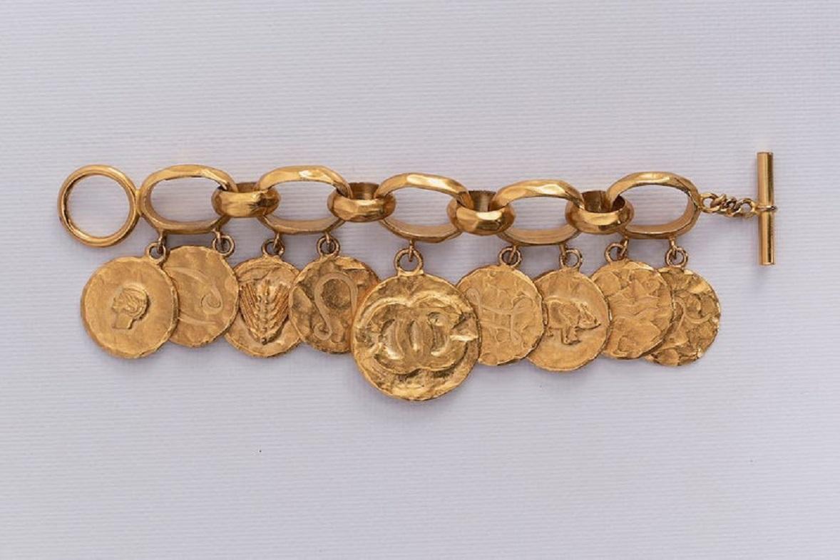 Chanel Astrological Signs Charms Bracelet in Gilded Metal, 1994 Spring In Excellent Condition For Sale In SAINT-OUEN-SUR-SEINE, FR