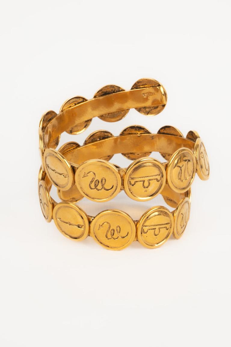 Chanel Astrologie Goldenes Spiralarmband aus Metall, 1990er-Jahre Damen im Angebot