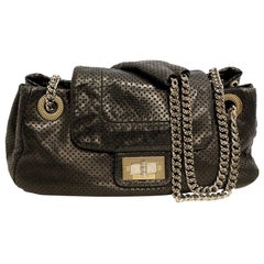 Vintage Chanel Authentic Black Perforated Leather Drill Flap Bag With Silver Tone Chain