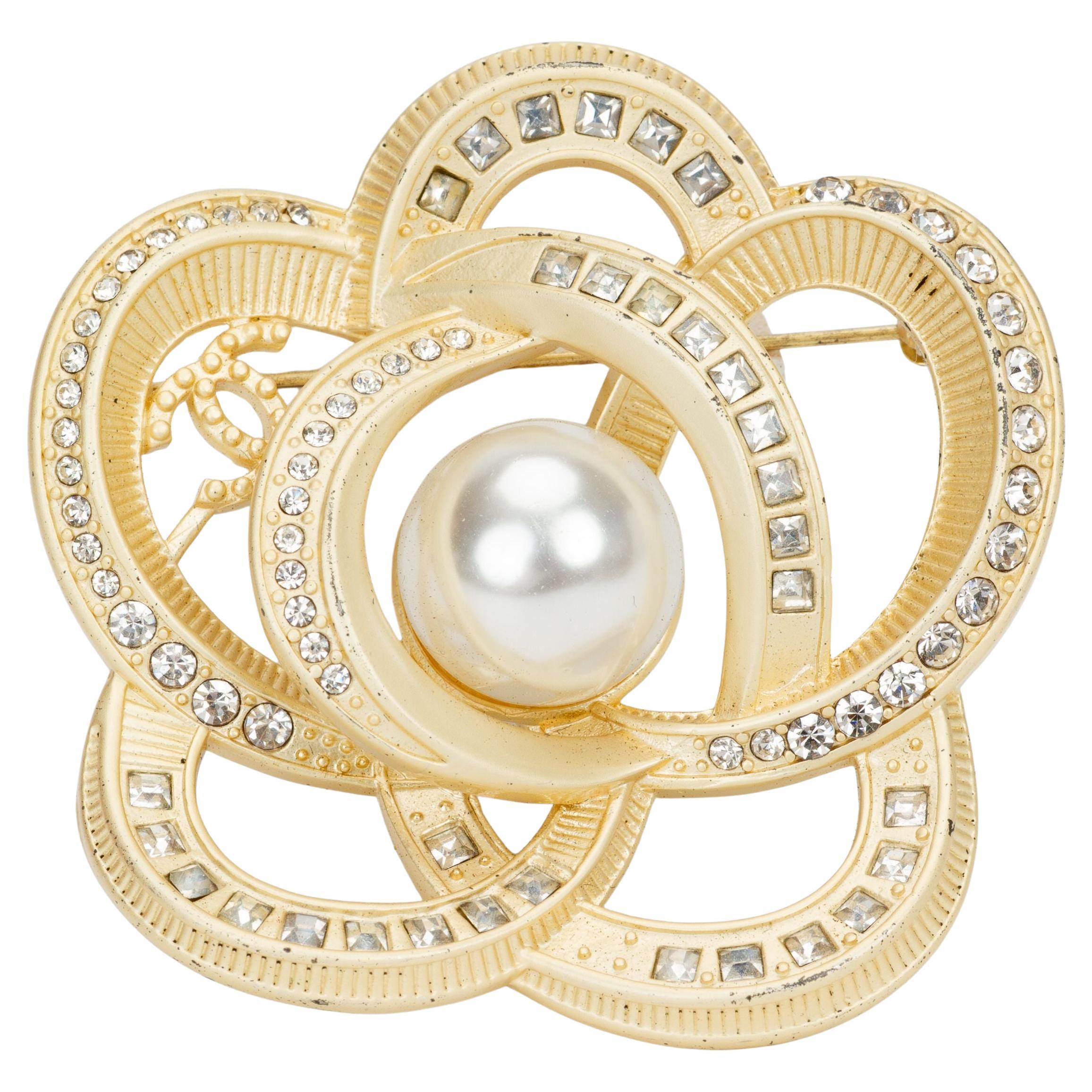 How do I authenticate a Chanel brooch?