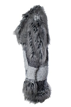 Chanel, cappotto in pelliccia grigio fantasia collezione autunno-inverno 2010
