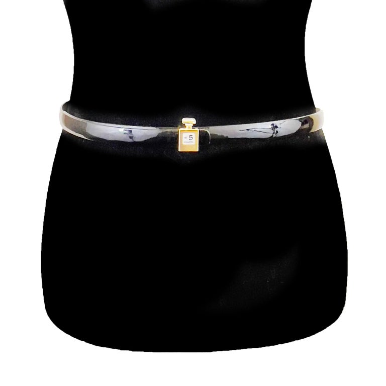 CHANEL - B12 A Slim Black Belt - Perfume No.5 Bottle Buckle - 75 / 30

Description

Autumn 2012 Collection.
Slim black leather belt
Features a closure in the shape of Chanel No.5 perfume bottle.
Adjustable fit.

Measurements

Length: 34 in / 86.36