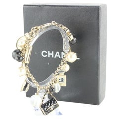 Chanel B13 Gold x Black CC Logo  Flap Clover Charm Bracelet  1CC1027