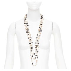 CHANEL B14C Coco Mademoiselle Figure black beige pearl triple sautoir necklace