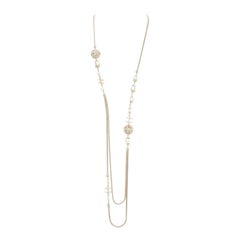 CHANEL B16A gold tone faux pearl CC logo round globes necklace