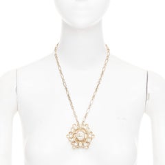 CHANEL B16C gold tone ivory pearl octagonal CC Camellia medallion chain necklace