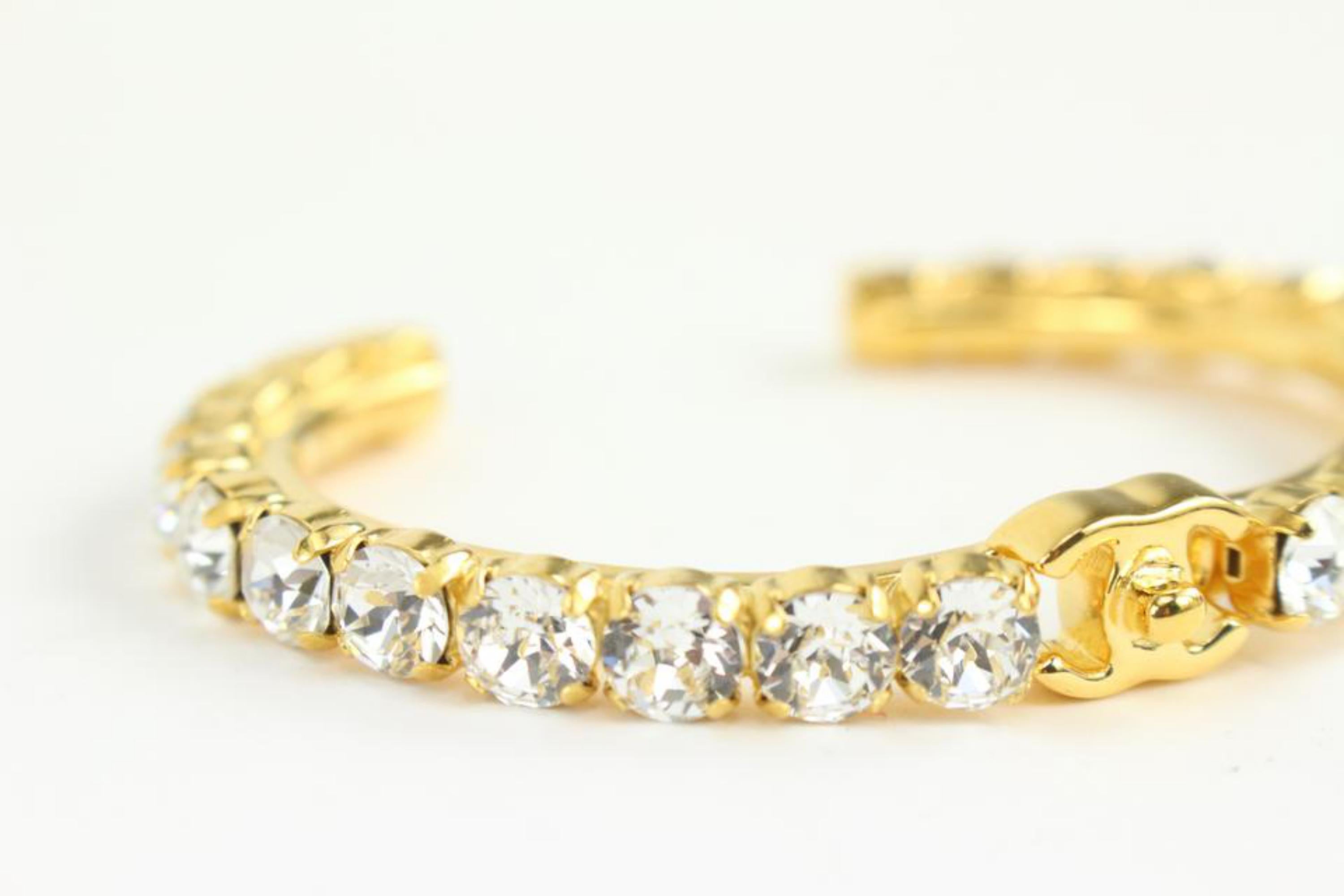 Chanel B20A Gold Crystal More is More CC Turnlock Bangle Bracelet Cuff 1118c6
Date Code/Serial Number: B20 A
Made In: Italy
Measurements: Length:  2.75