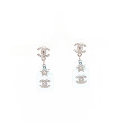 CHANEL B23S Cocomark blue acrylic perfume bottle CC logo star pin earrings Pair