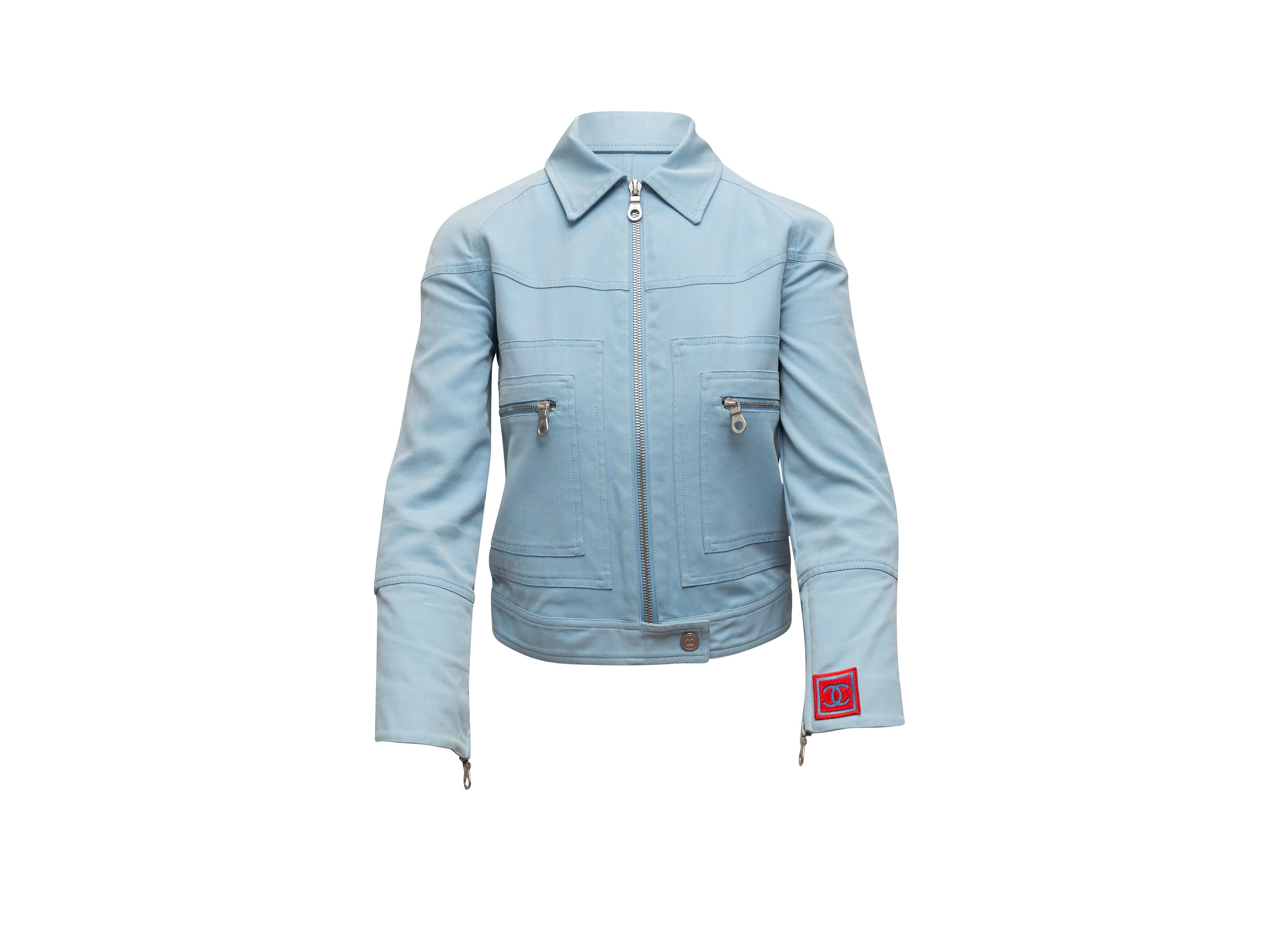 Product details: Vintage baby blue cotton biker jacket by Chanel Identification. Circa 2002. Pointed collar. Silver-tone hardware. Dual hip pockets. Zip closure at front. Designer size 34. 30