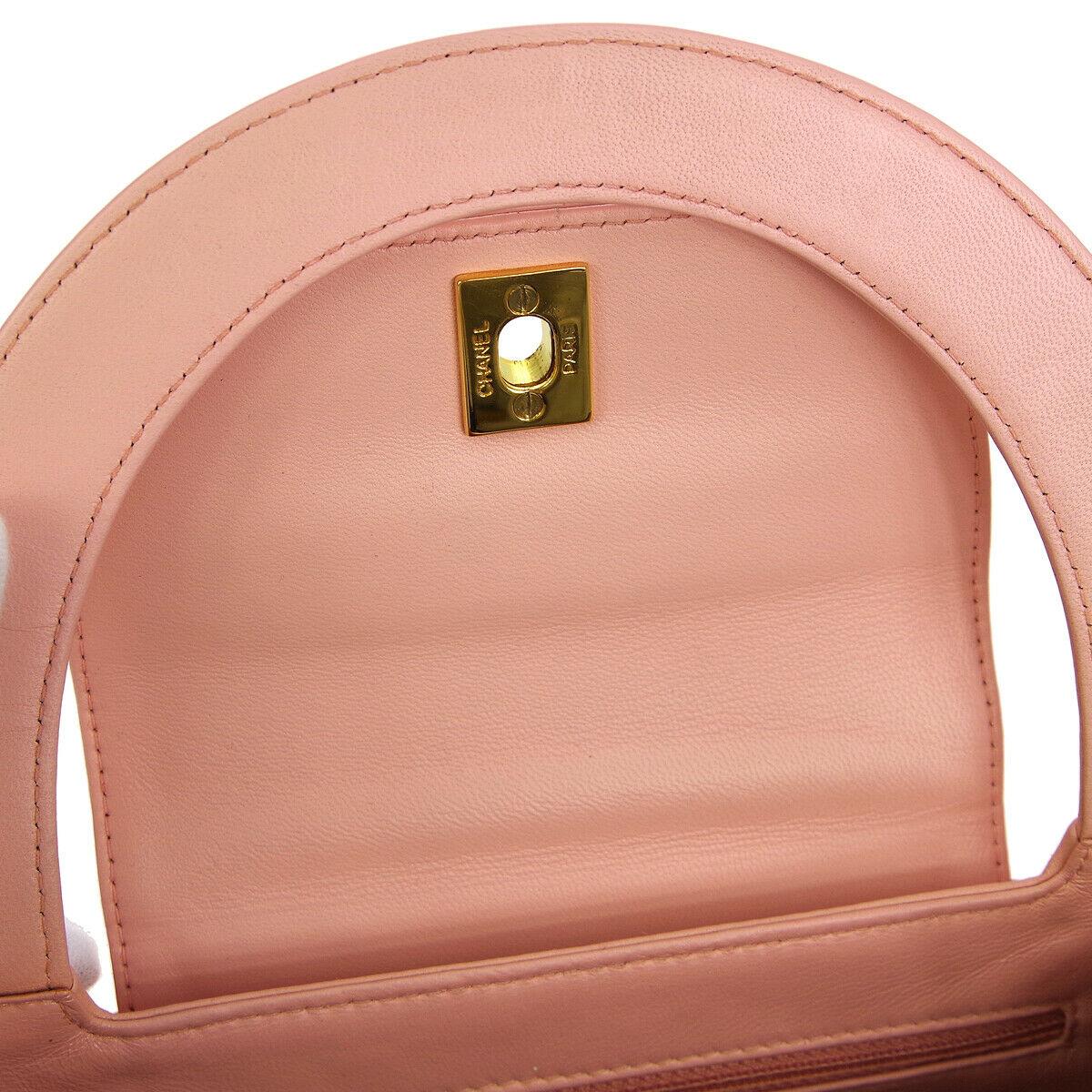 Chanel Baby Pink Leather Top Handle Satchel Kelly Style Small Party Evening Bag

Leather
Gold tone hardware
Leather lining
Turnlock closure
Handle drop 3.5