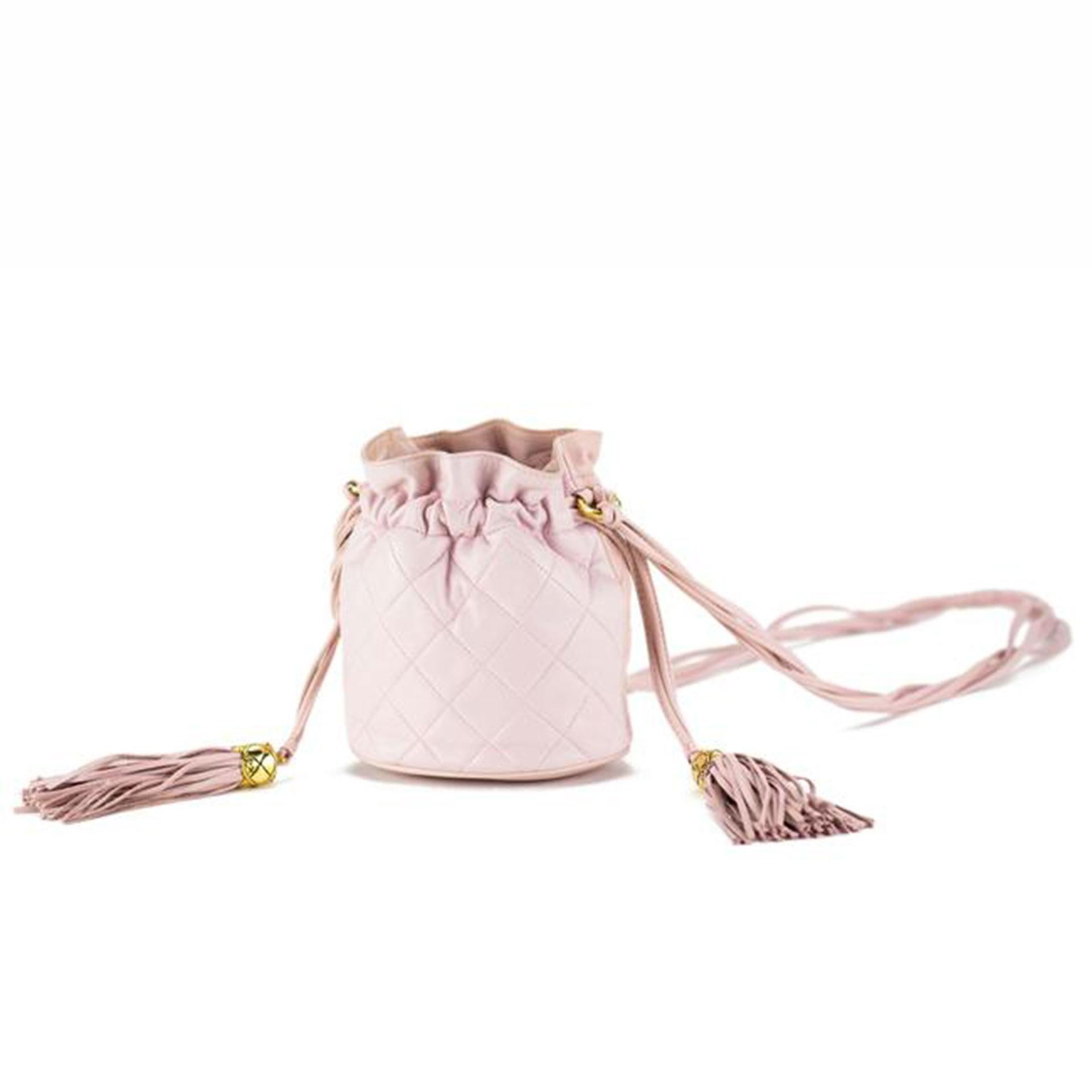 Women's or Men's Chanel Baby Soft Pink Mini Drawstring Quilted Tote Bag For Sale