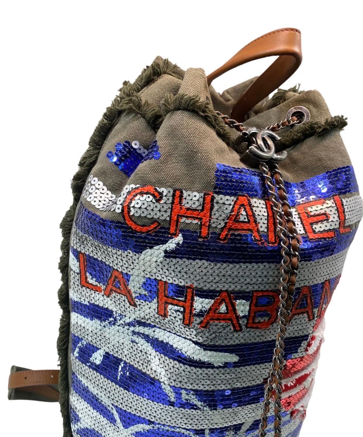 

Chanel backpack, Cuba model, limited edition, made of military green canvas with colored sequins on the front.

Equipped with a closure with a chain braided lace, internally lined in pink canvas, very roomy.

Equipped with two adjustable shoulder