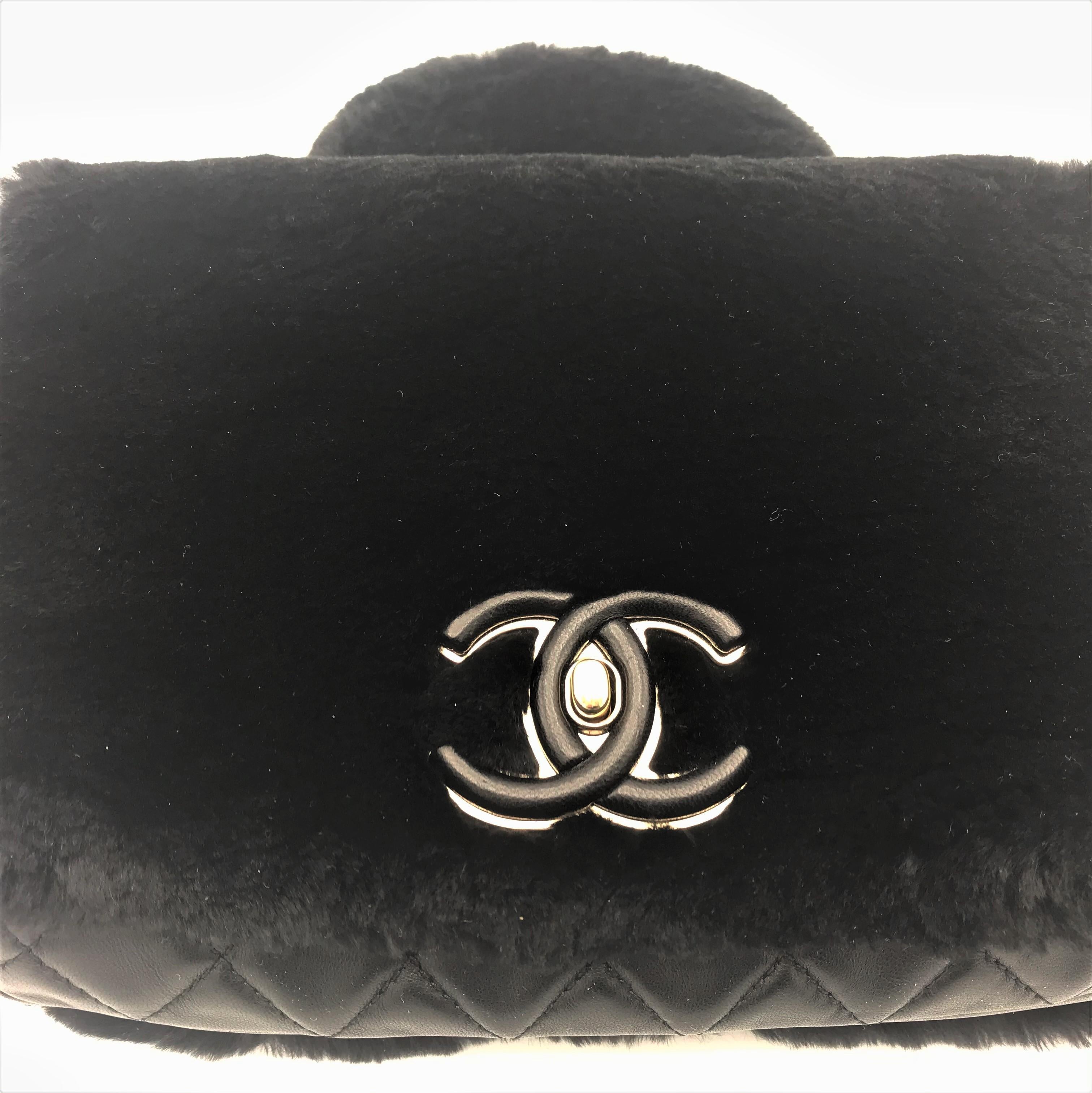 CHANEL bag in black calfskin leather with black glossy shearling, 2017. For Sale 8