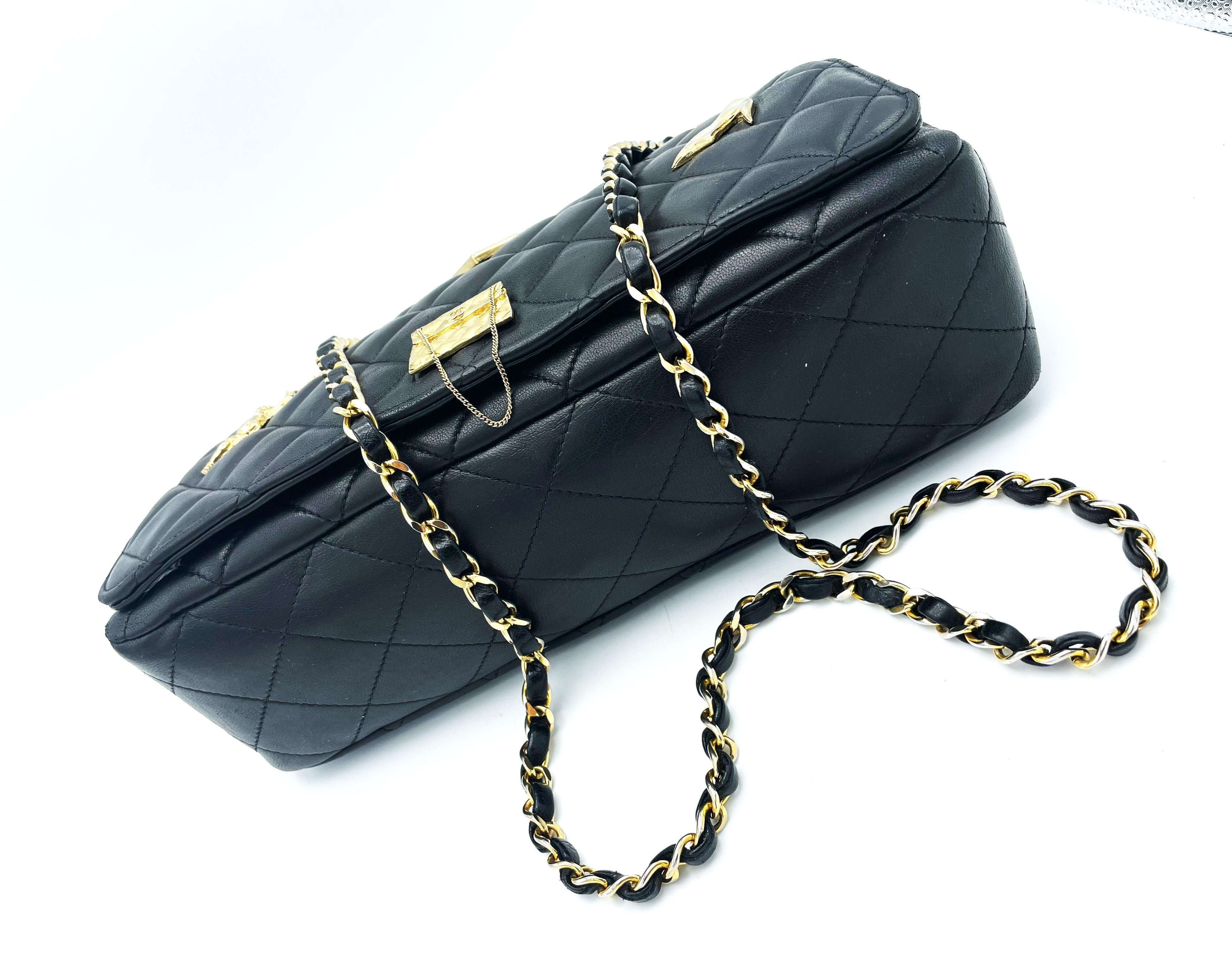 TIMLESS CHANEL BAG, black lambskin, with 6 iconic charms, collection 1994/96 For Sale 1