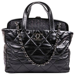 Chanel Bag in Aged Quilted Black Leather and Dark Gray Tweed