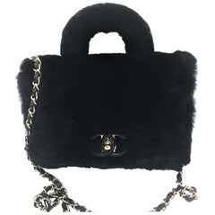 CHANEL bag in black calfskin leather with black glossy shearling, France 2017s