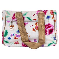 Borsa Chanel in tela floreale con manici in oro