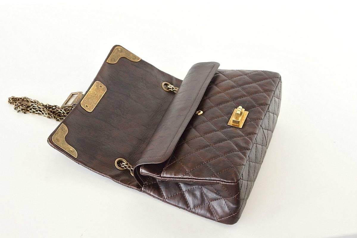 Absolutely fabulous Chanel bag Shanghai medium double flap distressed brown leather.
Leather is detailed like vintage scraped wood.
Antiqued hardware with edgy metal plaques and logo embossed studs on front flap corners.
Logo embossed hinged