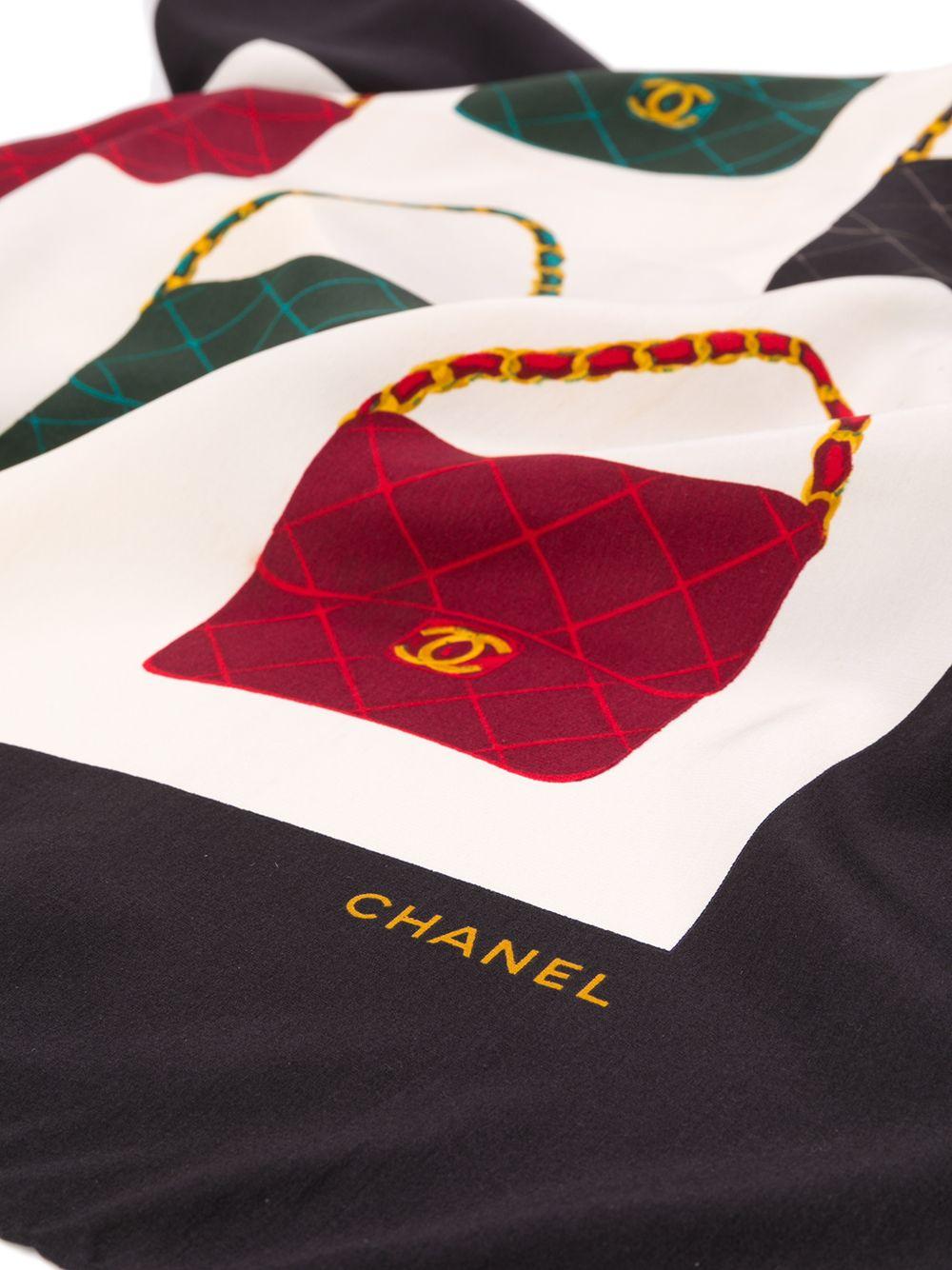 Crafted in France from the finest cream silk, this pre-owned scarf by Chanel features a lightweight construction, a square shape and an elegant, all-over print of the brand's signature 'CC embellished flap bag' in alternating patterns of black, red