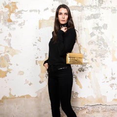 CHANEL Baguette Bag in Gilded Quilted Leather