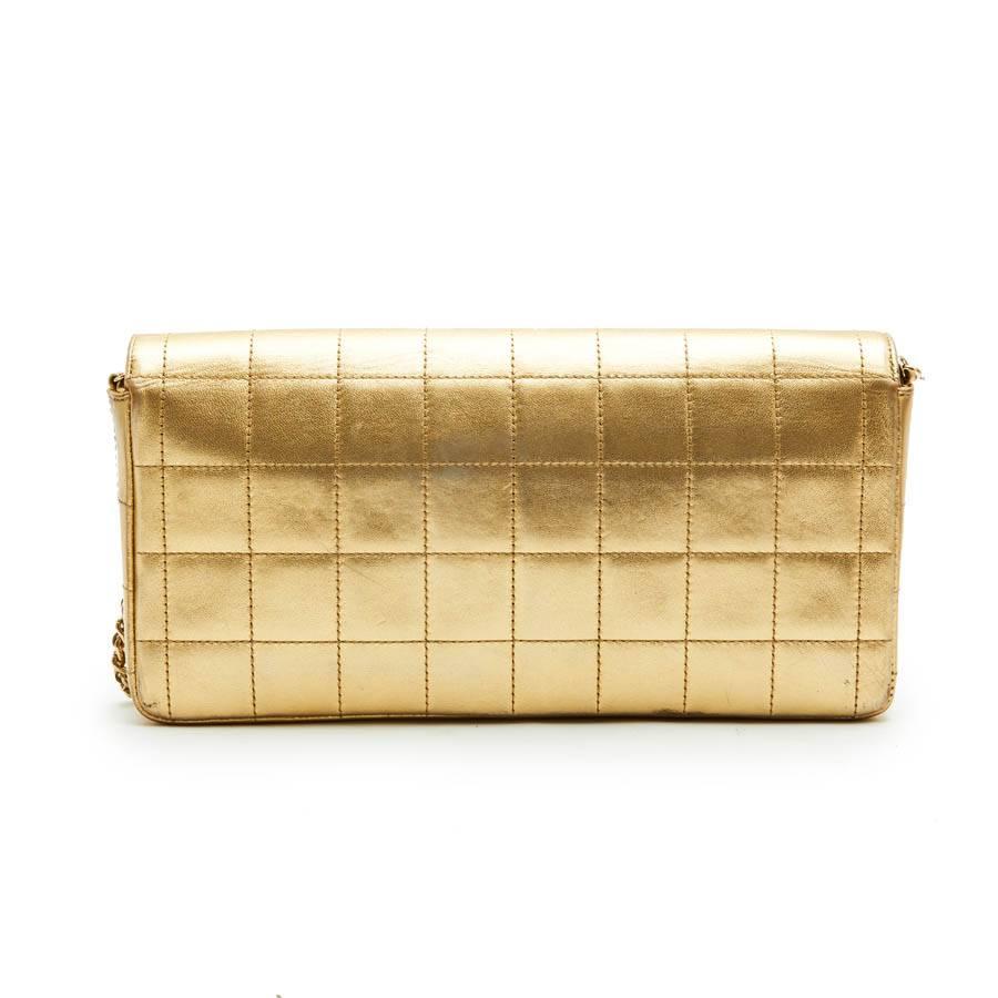 Brown CHANEL Baguette Bag in Gilded Quilted Leather