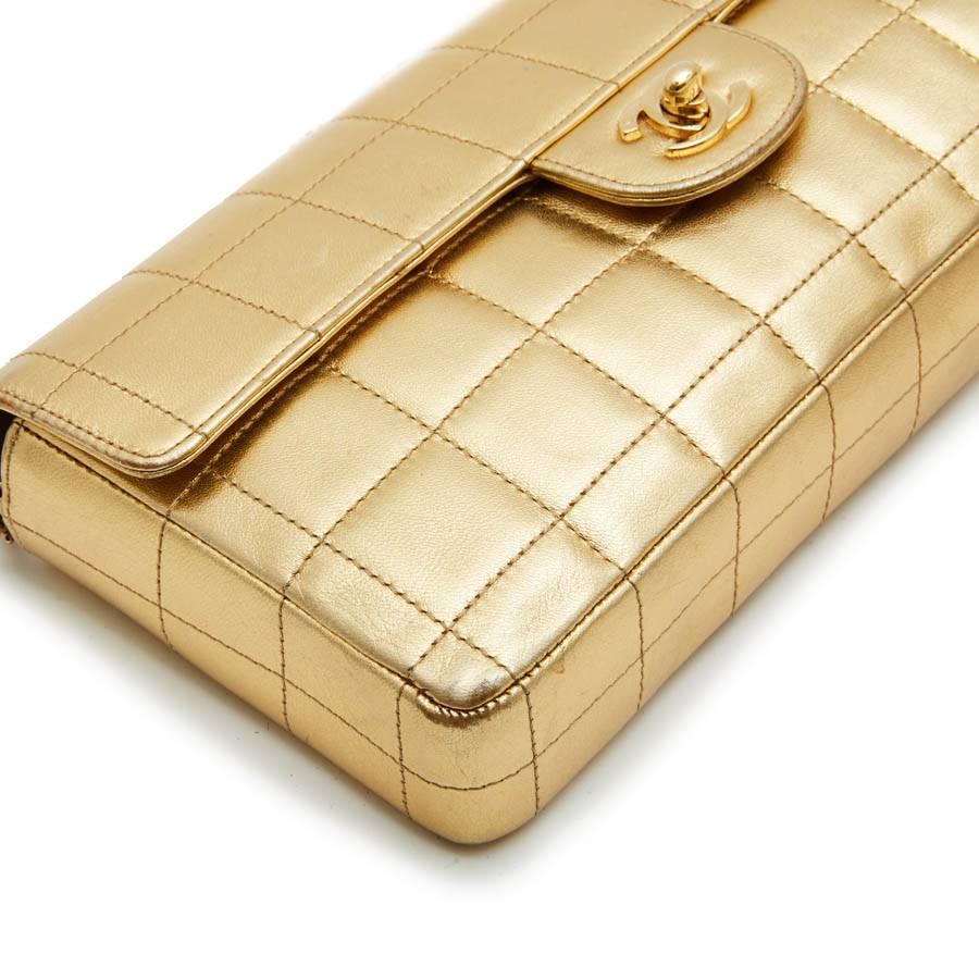 Women's CHANEL Baguette Bag in Gilded Quilted Leather