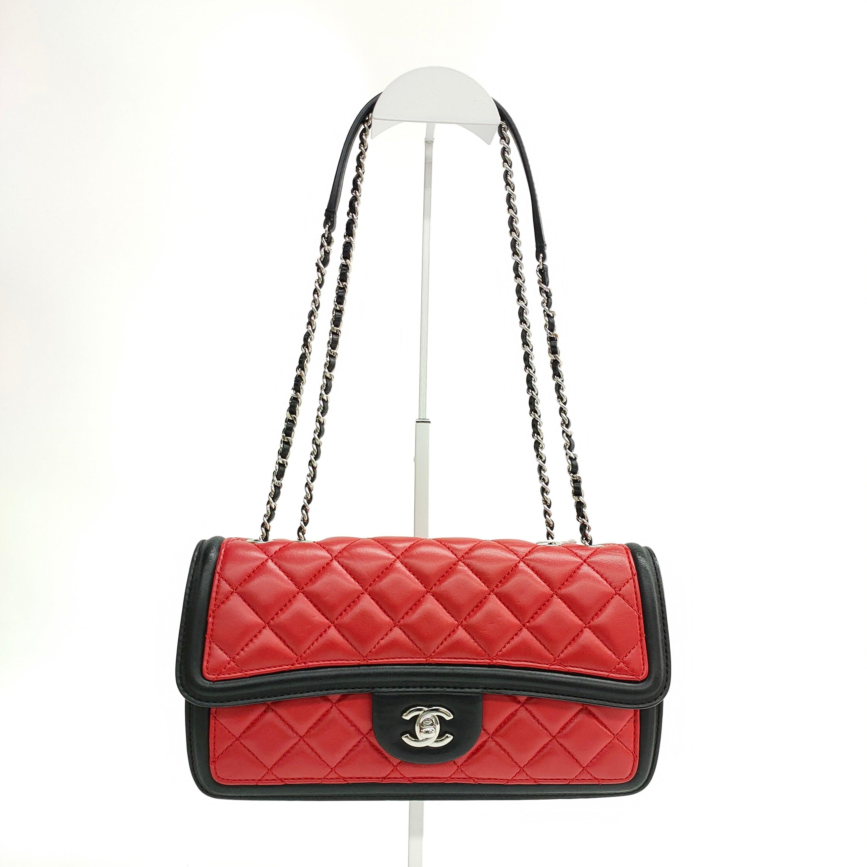 Chanel Baguette Flap Shoulder Bag Lambskin Red and Black Silver Double Chain
These are professional photos of the actual bag.
  This Chanel baguette shoulder bag showcases a stunning blend of red and black hues, complemented by sleek silver