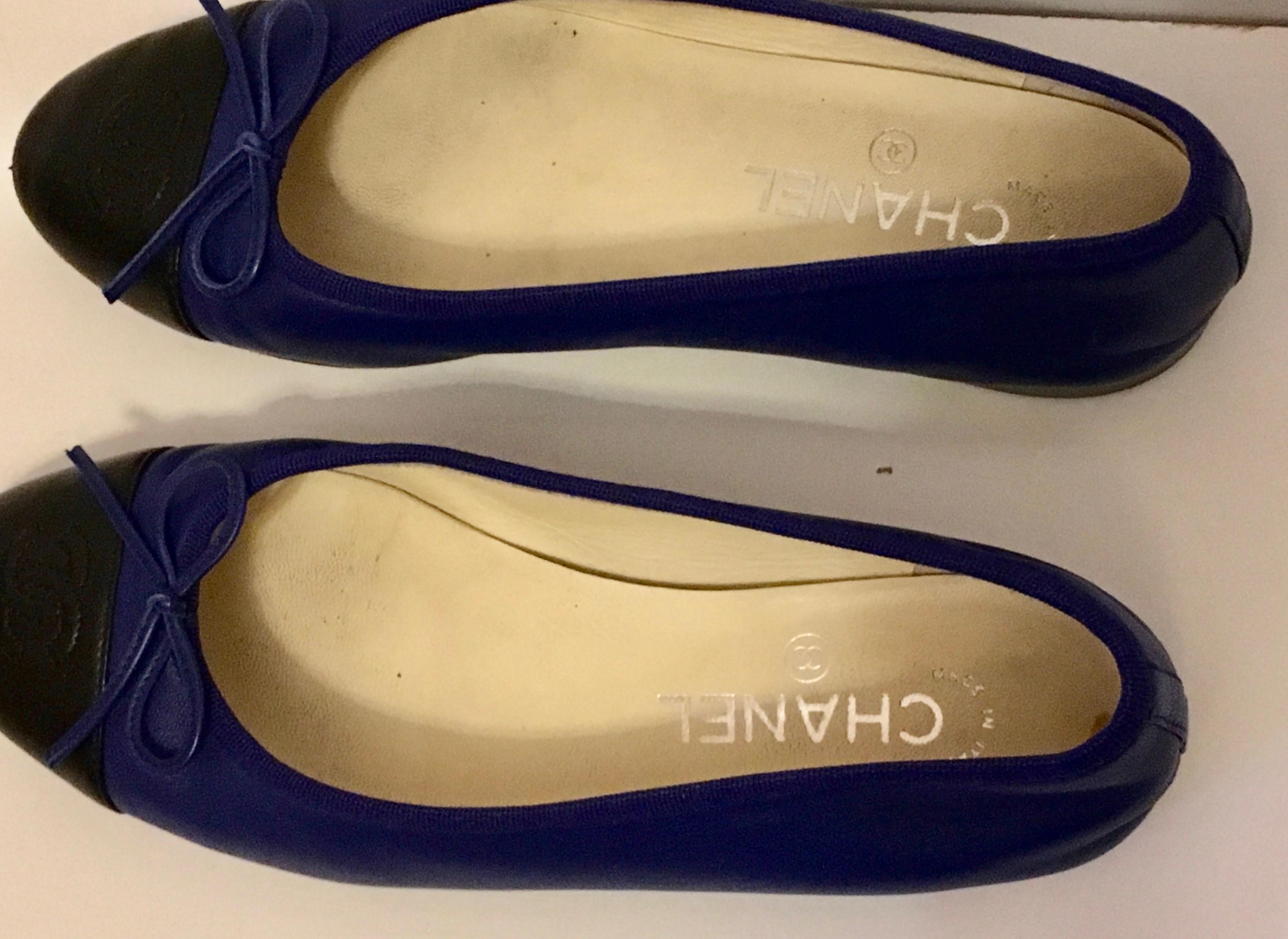 Presented here is the classic Chanel Ballerina flat in a beautiful shade of royal blue with black tip.