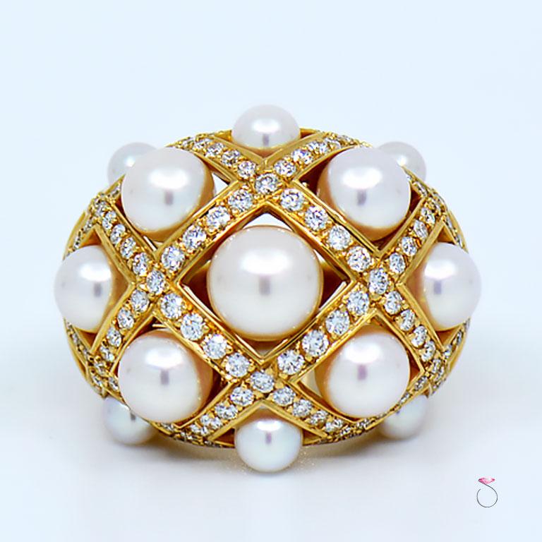Beautiful CHANEL Baroque Matelasse' large version ring, cultured pearls and diamonds. This stunnong Chanel Matelasse' ring is beautifully crafted in 18k yellow gold. The ring features a gorgeous large dome design incrusted with 13 white cultured