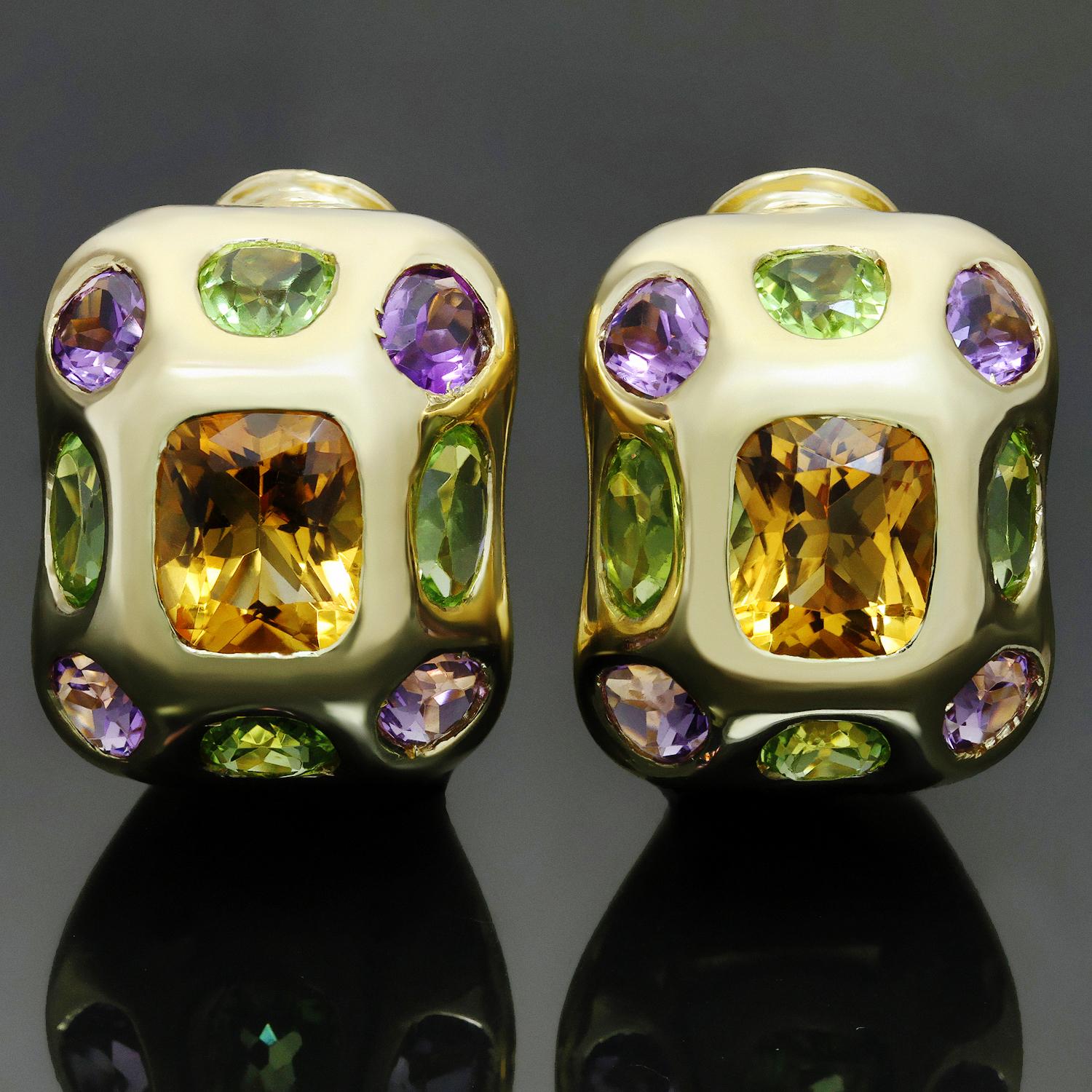 These chic Chanel dome-shaped lever-back earrings from the vibrant Baroque collection are crafted in 18k yellow gold and feature faceted citrines in the center surrounded by 4 amethysts and 4 peridots. Made in France circa 2010s. Measurements: 0.70