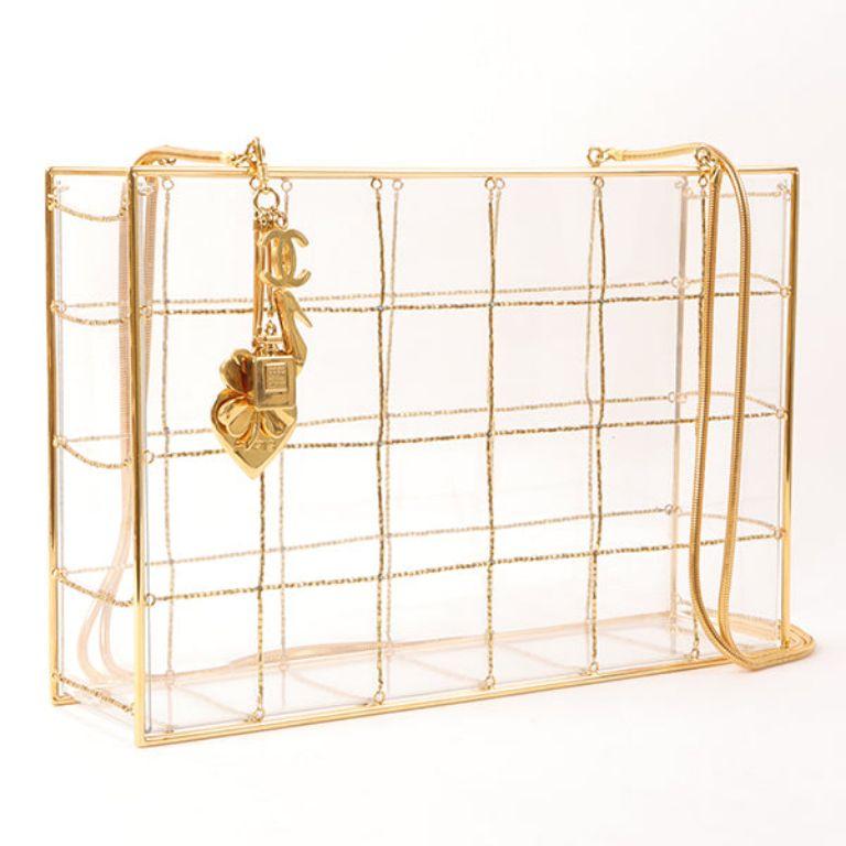 Chanel Beads Chocolate Bar Logo Charm Chain Shoulder Bag Clear

Additional information:
Measurements: H 19cm x W 28cm x D 7cm 
Shoulder drop: 90cm

This item has been used and may have some minor flaws. Before purchasing, please refer to the images