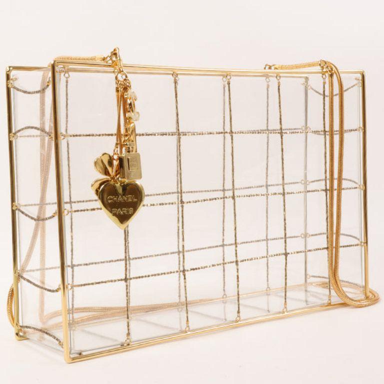 Chanel Beads Chocolate Bar Logo Charm Chain Shoulder Bag Clear

Additional information:
Measurements: H 19 x W 28 x D 7 cm 
Shoulder drop: 90 cm

This item has been used and may have some minor flaws.
