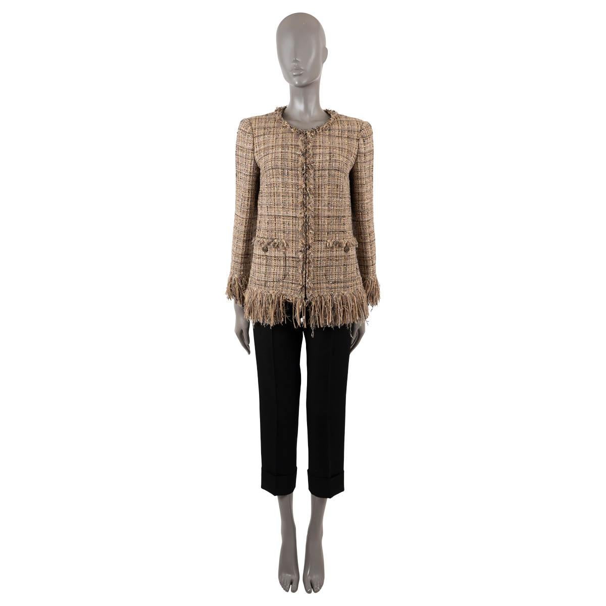 100% authentic Chanel tweed jacket in beige, brown, grey and black goatksin leather (36%), wool (21%), polyester (16%), cotton (7%), nylon (7%), viscose (5%), acrylic (3%), other fibers (3%) and linen (2%). Features a collarless round neck, fringed