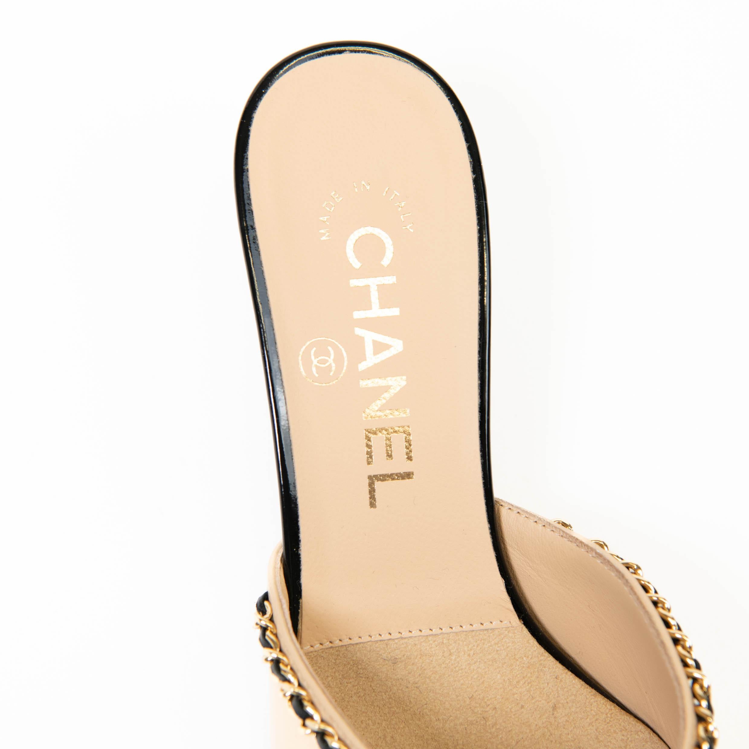 100% Authentic 

These chic mules are crafted of lambskin leather in beige with leather threaded chain link detail, and gold Chanel CC logo. They feature a black patent leather cap toe and a 1.75-inch stylized patent leather covered heel.

Excellent