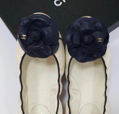 Chanel Beige Black Camellia Ballet Flats