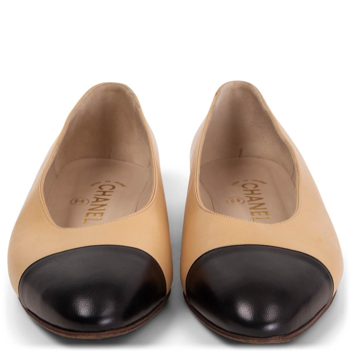 100% authentic Chanel Vintage ballet flats in beige calfskin with a black tip. Have been worn and are in excellent condition. 

Measurements
Imprinted Size	38
Shoe Size	38
Inside Sole	24.5cm (9.6in)
Width	7.5cm (2.9in)
Heel	1.5cm (0.6in)

All our